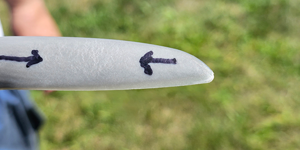 The author noticed that this propeller on a competitor’s airplane had tiny "check cracks" along one of the blades, likely incurr