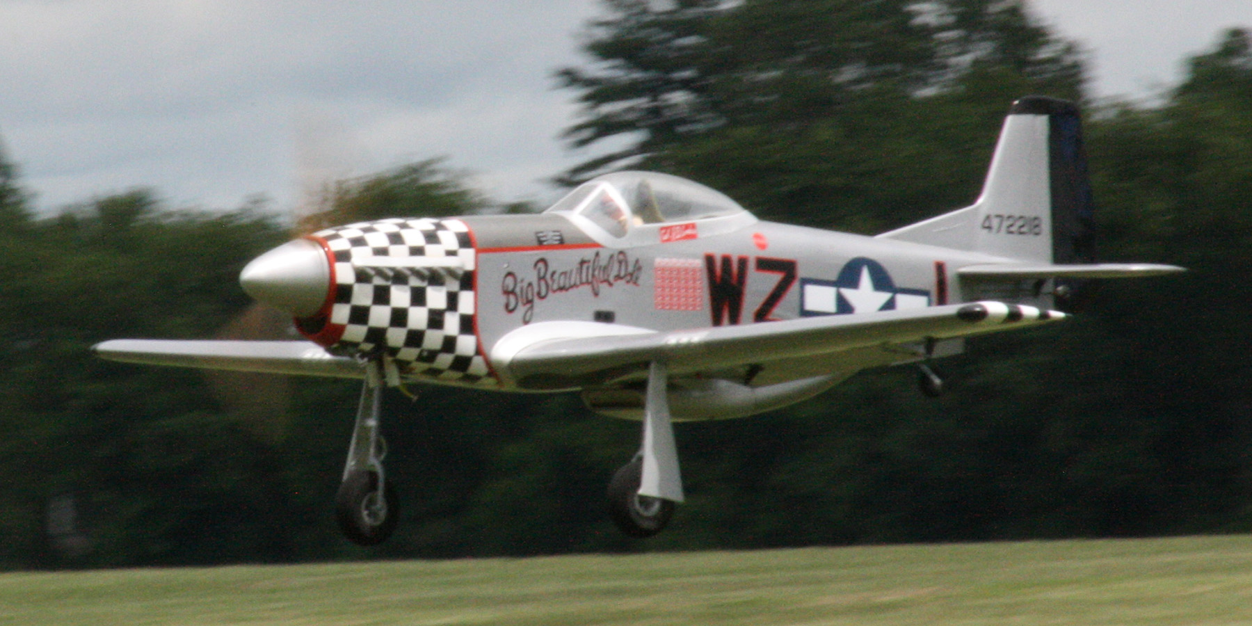 8. One of several P-51s about to touch down. Alexander photo.