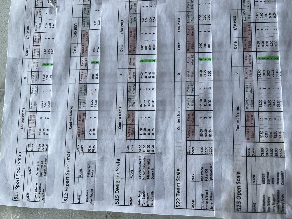 A crumpled piece of paper with printed tables and text in rows and columns.