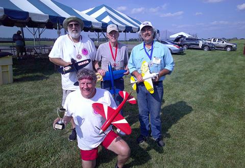 Perky Speed winners Bill Hughes (L), Henry Nelson (C), Glen Van Sant (R), and Patrick Hemple (kneeling)