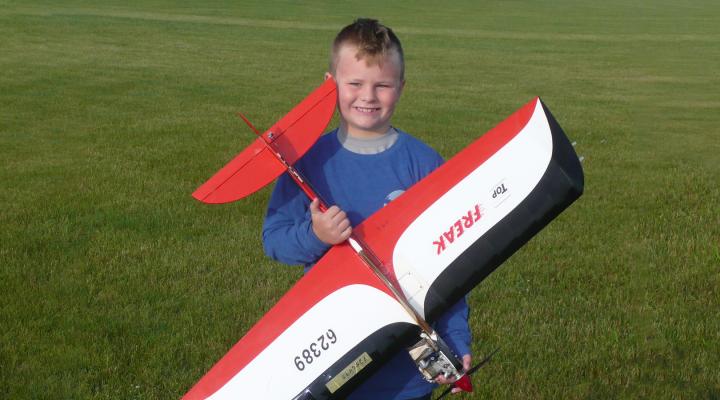 Tyler Skukalek with his airplane.