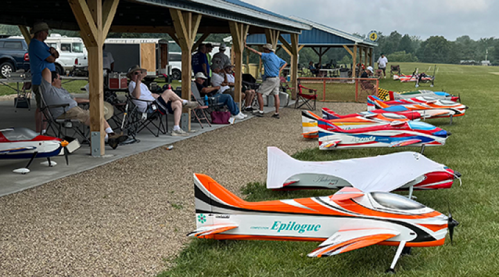 The Advanced pilots have their airplanes lined up at Site 4, ready for the low ceiling to lift.