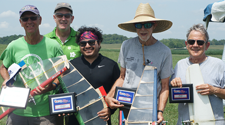 The 2024 1/2A Combat winners (L-R): Jeff Johnson, first; Event Director Dave Edwards; Ariel Quezada, second; Chuck Rudner, third; and Chris Gay, fourth.