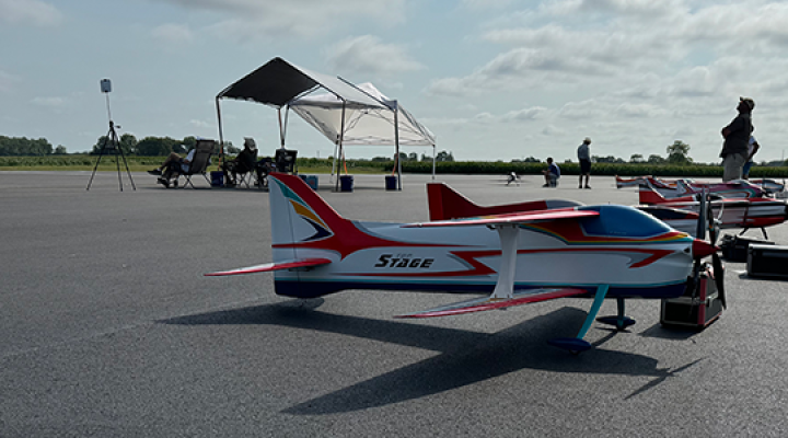FAI pilots have their airplanes lined up in flight order at Site 1, ready to begin round 4.